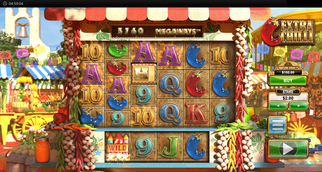 Extra Chilli Megaways screenshot showing the gold Fireworks Wild symbol landing on the reels among crystal chilli and card symbols