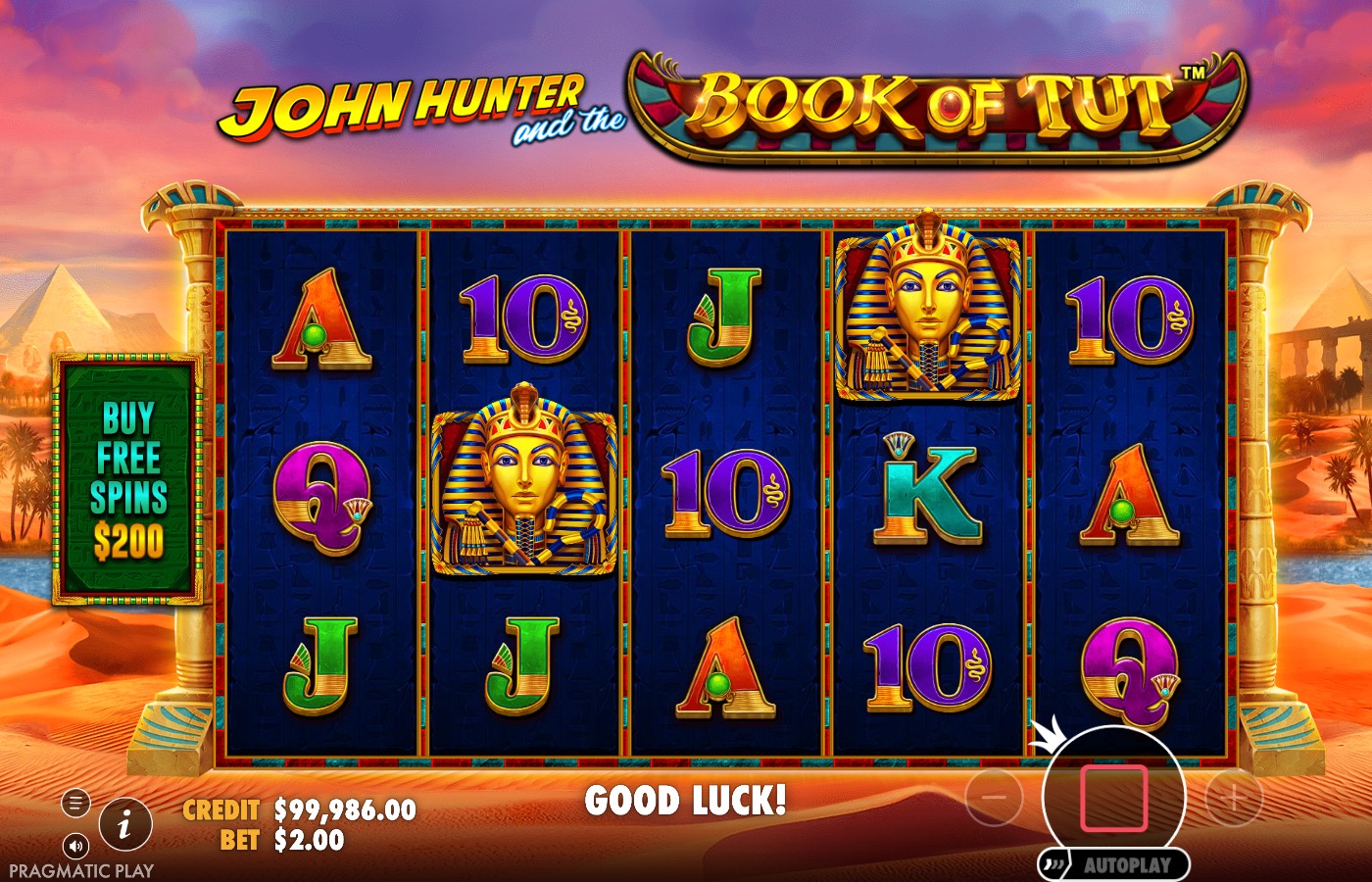 John Hunter and the Book of Tut screenshot showing two Tutankhamun death-mask symbols landing near each other on the reels