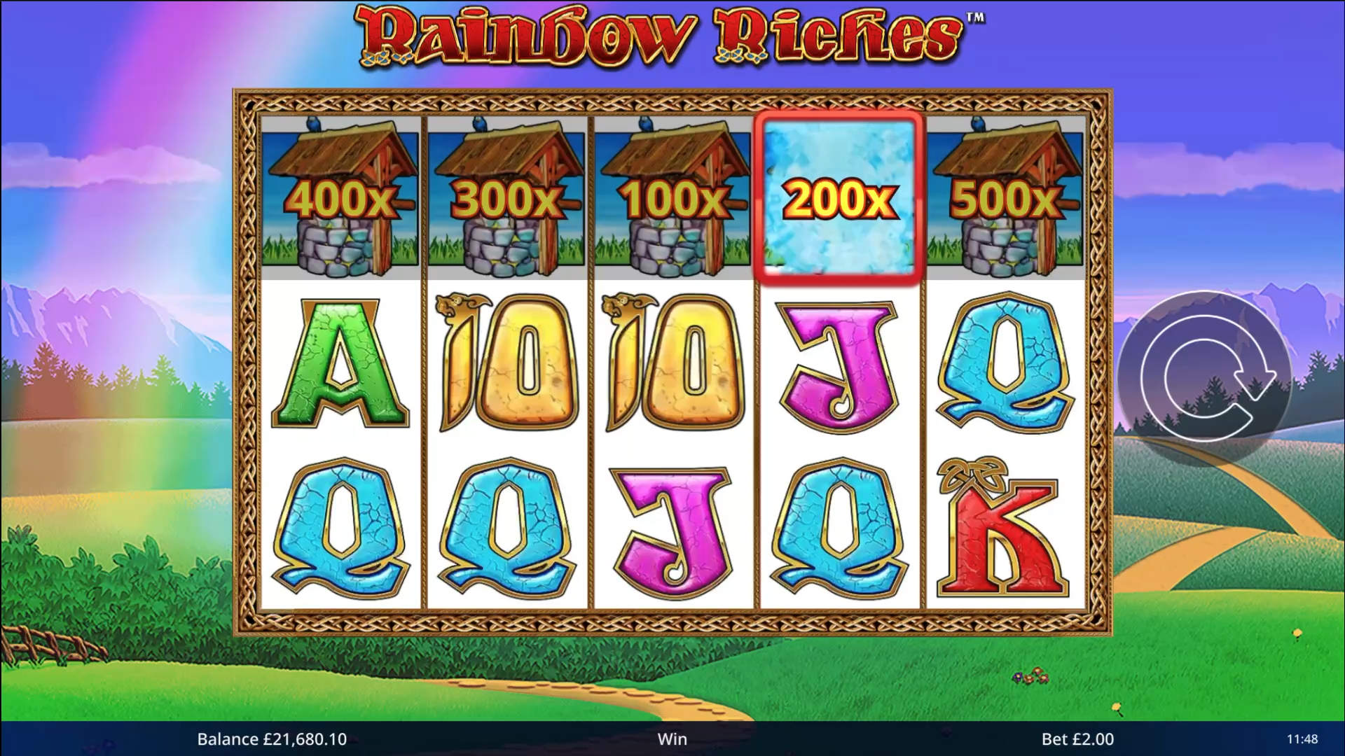 Rainbow Riches Wishing Wells bonus feature showing five wells with multiplier values up to 500x