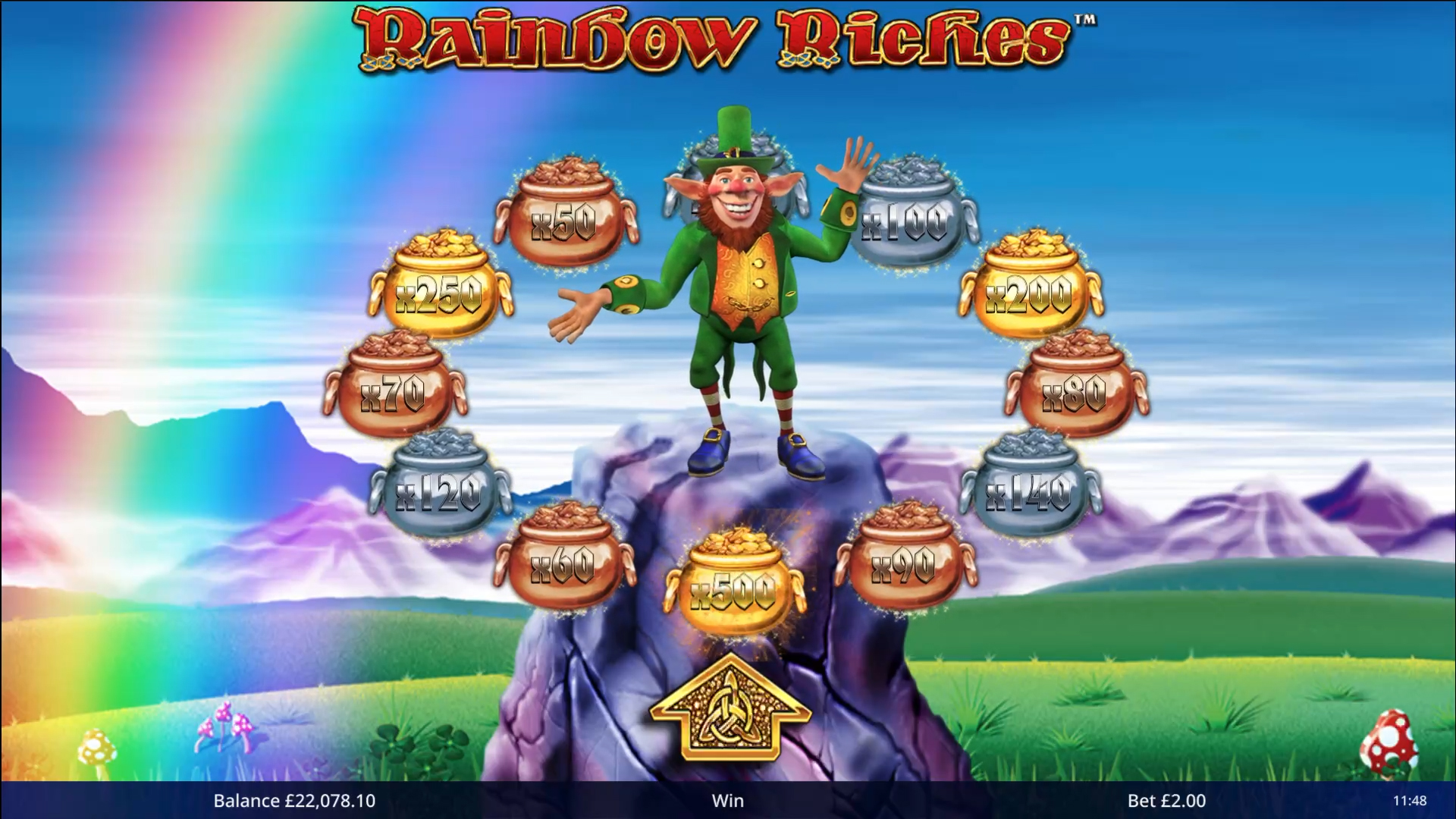Rainbow Riches Road to Riches bonus wheel and multiplier pots surrounding a leprechaun
